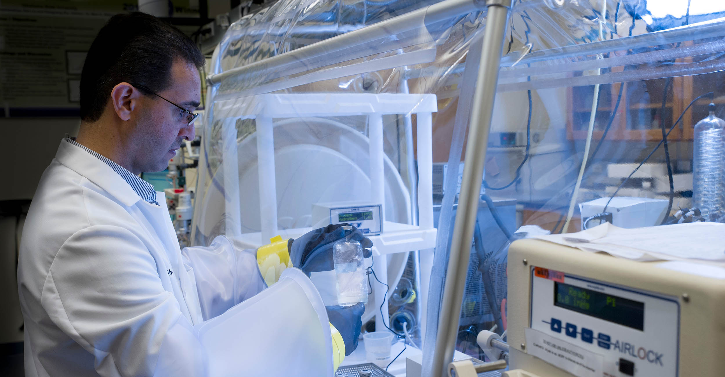Image of Hasan Atiyeh working in his laboratory.