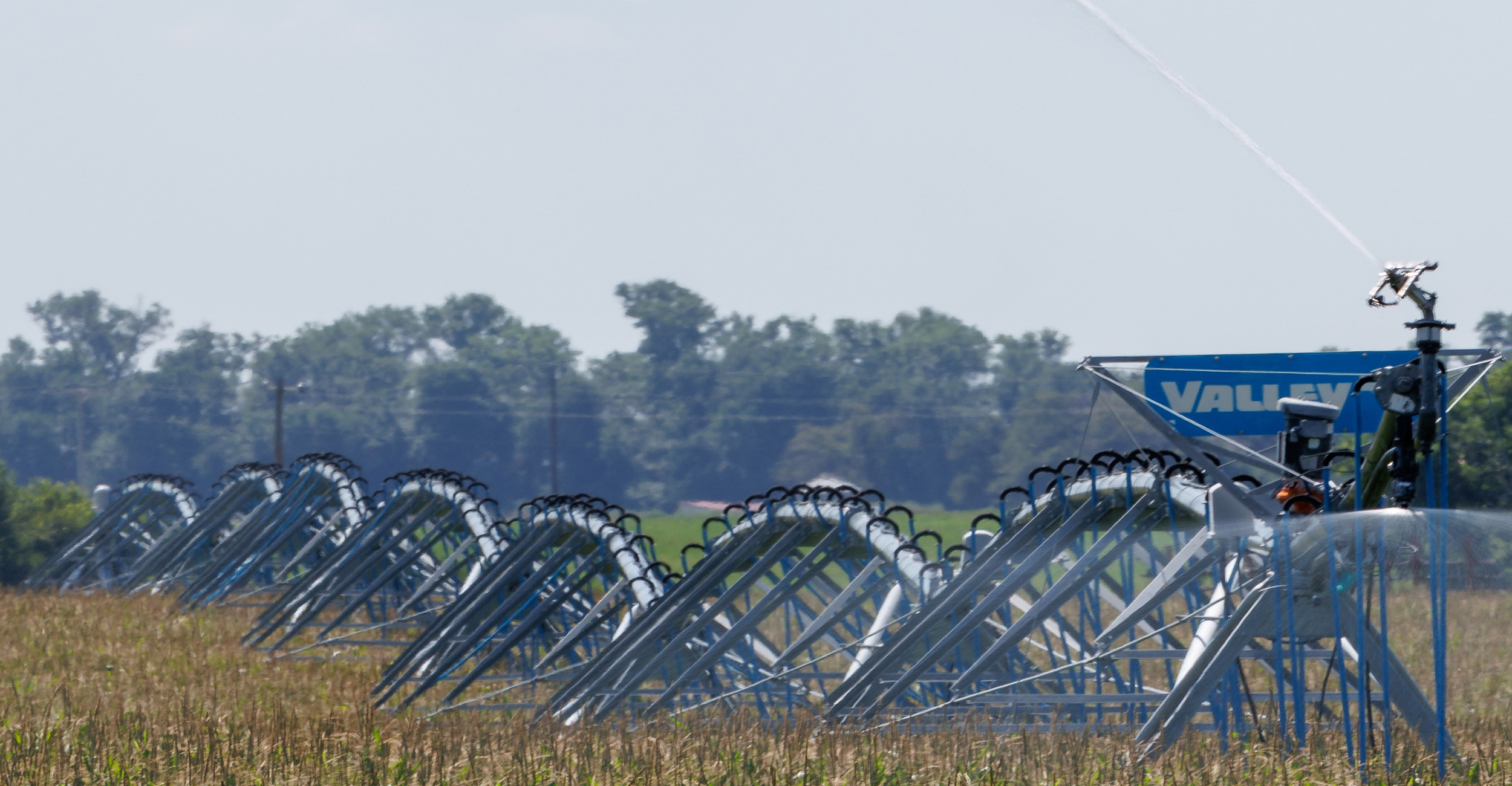 A farmer's field is irrigated. 